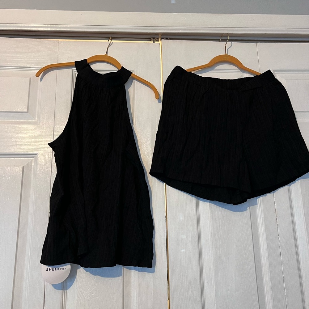 Black co ord set. Shorts and high neck tunic. Size 0XL NWT